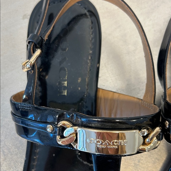 Coach Glossy Black Sandals with Metallic Gold Detail - Picture 2 of 9